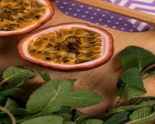 Basket filled with lulo, maracuya, and tropical fruits